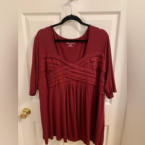 Jessica London rust colored top with some wear.